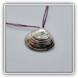 J55. SIlver clam shell pendant. - $18