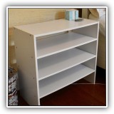 F53. Small white shelf. 23"h x 24"w x 12"d - $12
