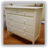 F81. White painted 5-drawer dresser. 43"h x 45"w x 20"d - $350