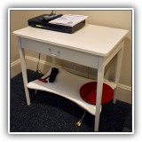 F85. White painted table with drawer. 28"h x 31"w x 21"d
