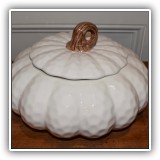 D83. White ceramic pumpkin. 7.5"h x 10"w - $14