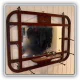 D04. Carved beveled mirror with hooks. 21.5" x 29.5" - $95