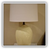D14. Cream colored or pale yellow ceramic table lamp. 16"h - $75