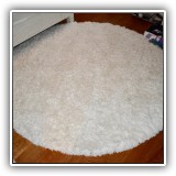 D40. Round shag rug. 73"w - $95