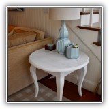 F28. Round painted side table. 25"h x 30"w - $125