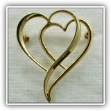J04. 14K Gold double heart pin. - $120