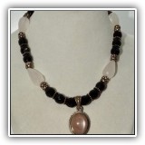 J26. Sterling silver and stone necklace with pendant. - $18