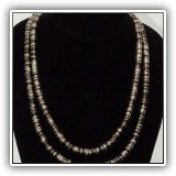 J32. Silver and black stacked necklace. 48" - $18
