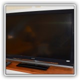 E01. 52" Sony TV. Model KDL-52V4100. - $175
